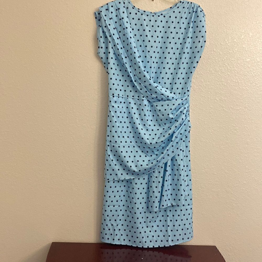 A large blue dress with a black polka dots!!